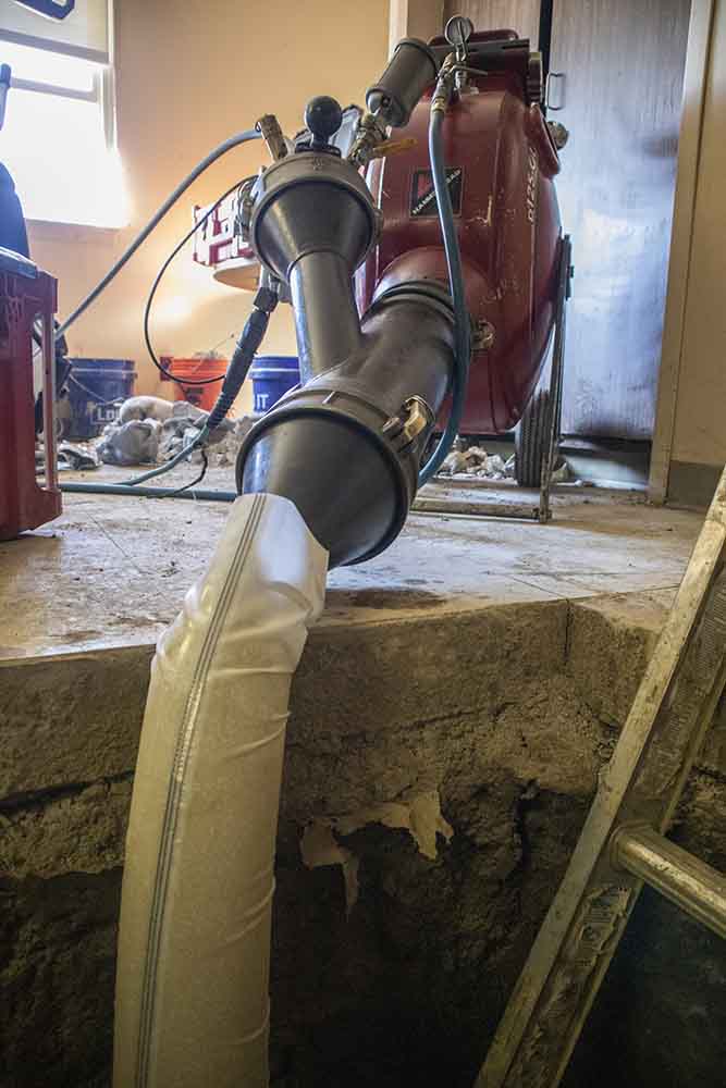 interior of an epoxy-lined pipe / pipe lining in progress