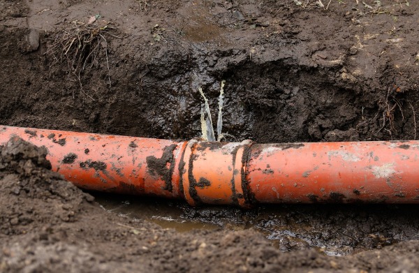 underground sewer pipe leak burst repair